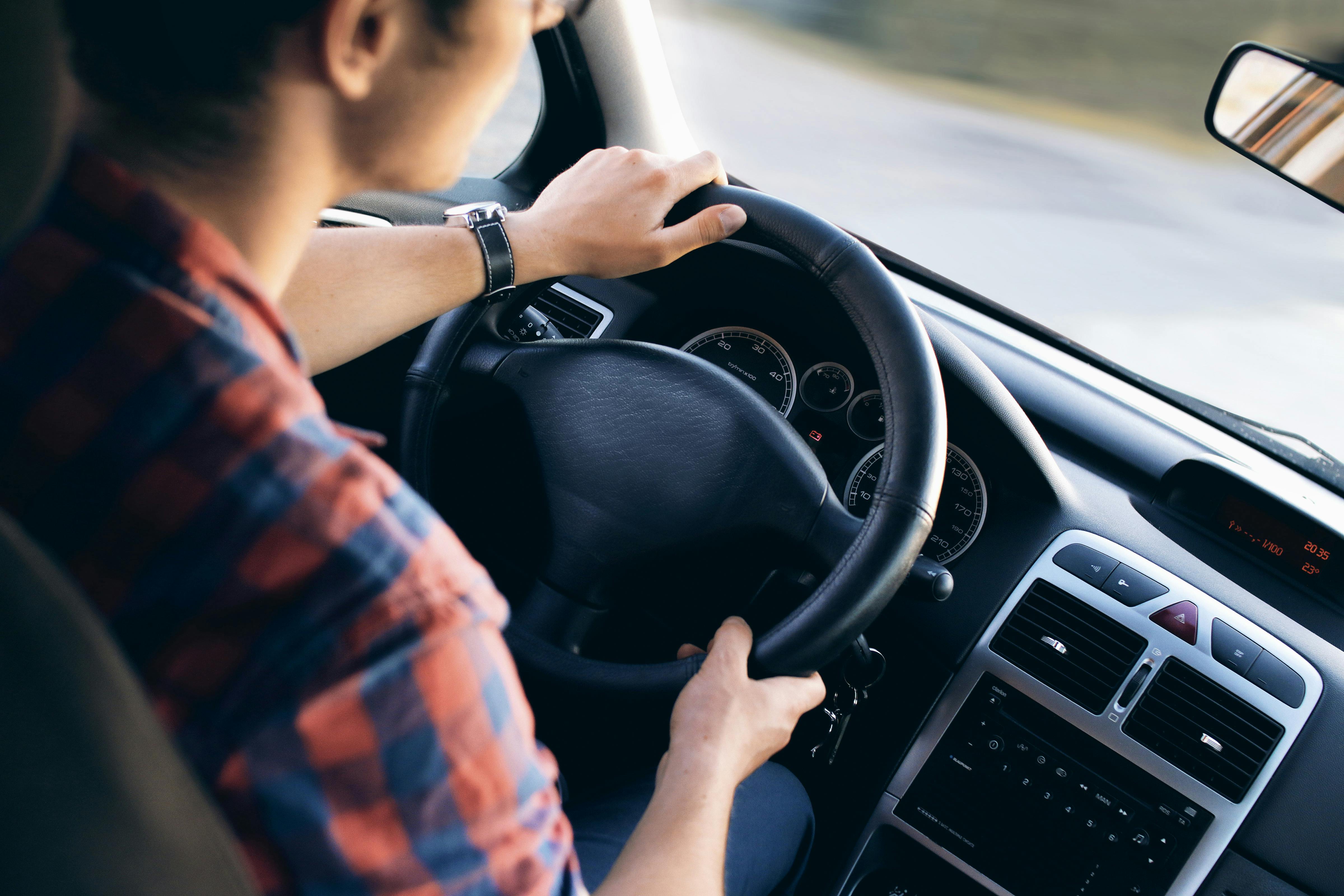 Person driving a car