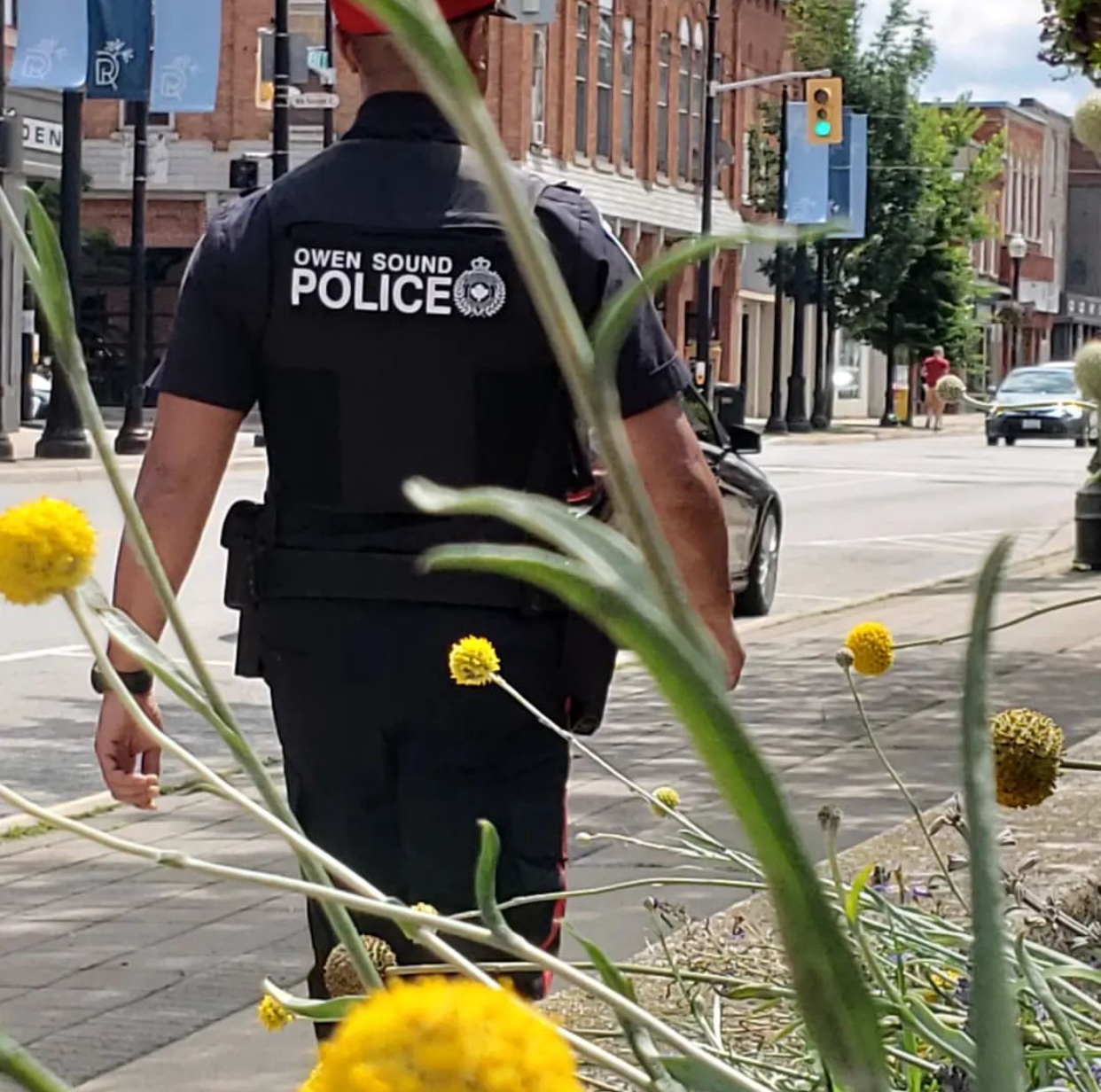 Officer walking in the River District